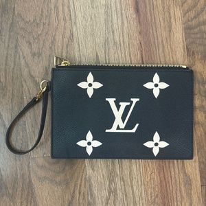 Bicolor Monogram Empreinte Leather pouch